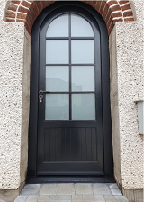 Traditional wooden door made to measure and installed perfectly.